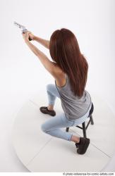 MOLLY SITTING POSE WITH GUN